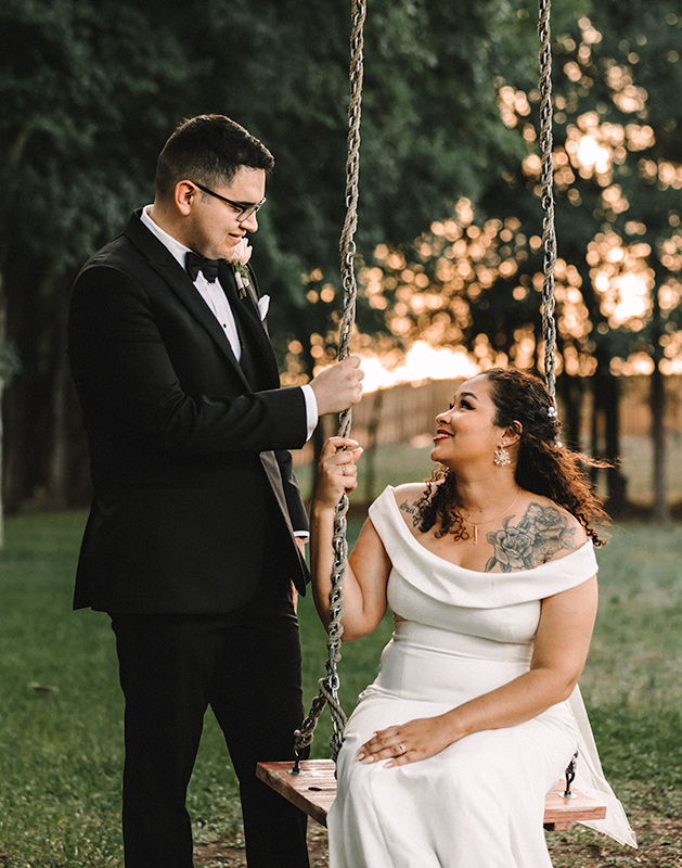 wedding sunset photos with bride and groom on swing at Texas Old Town - Sage Hall