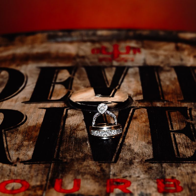 wedding rings on whiskey barrel at Devil's River Whiskey Distillery wedding venue