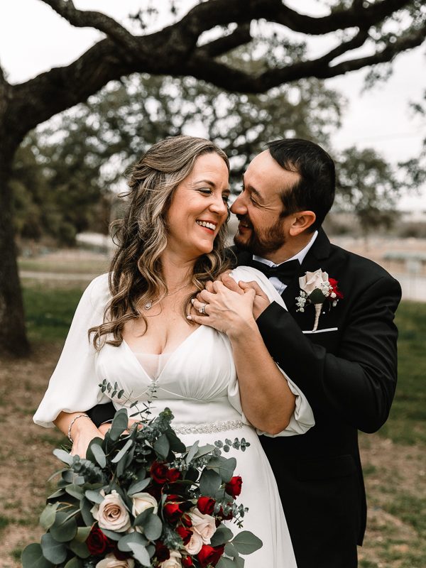 Portrait of smiling Bride and Groom after ceremony in San Antonio, TX
